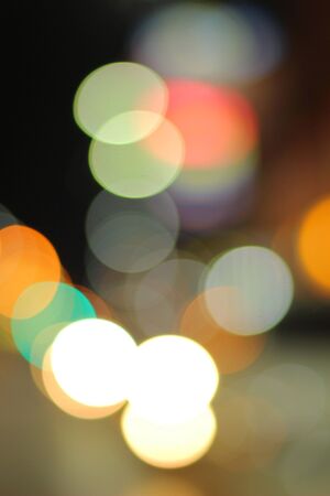 Blurred of car in city at nightの写真素材
