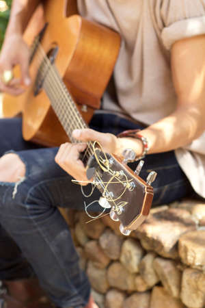 Male playing guitarの写真素材