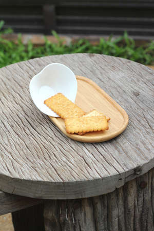 Tasty of crackers on wood tableの写真素材