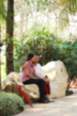 Blurred couple in the parkの写真素材