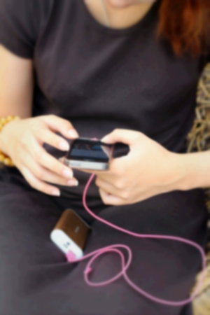 Woman using smart phoneの写真素材