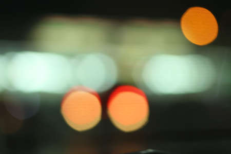 Blurred of car in city at nightの写真素材