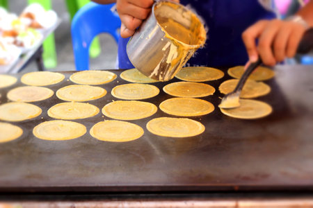 Making thai crispy pancake - cream crepes