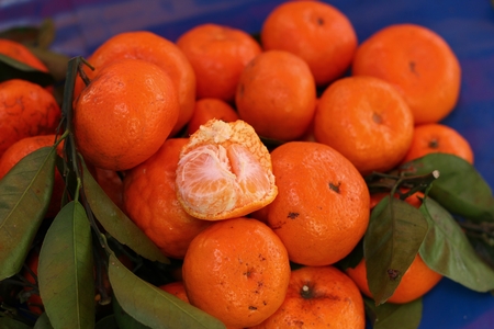 orange fruits in the marketの写真素材