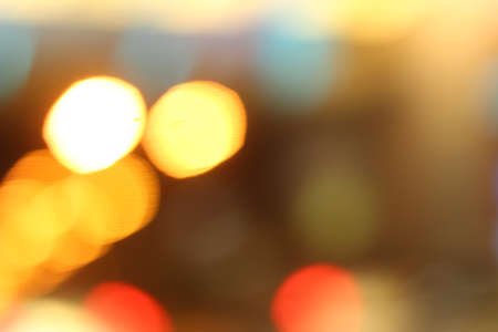 Blurred of car in city at nightの写真素材