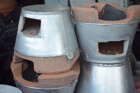 Earthenware brown- stove for cooking in Asia.の写真素材