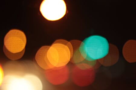 Blurred of car in city at nightの写真素材
