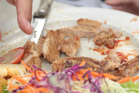 steaks and vegetable salad with french fries.の写真素材