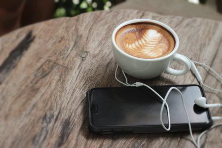 latte coffee in cup and smart phones