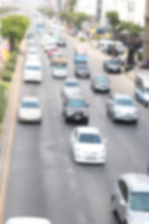 blurred of car on road at the city