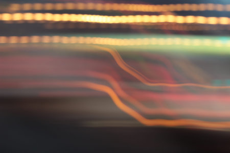 light background of car in city at nightの写真素材