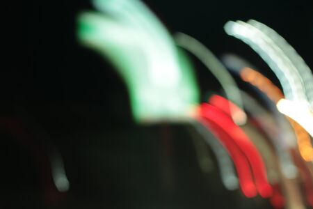 light background of car in city at nightの写真素材
