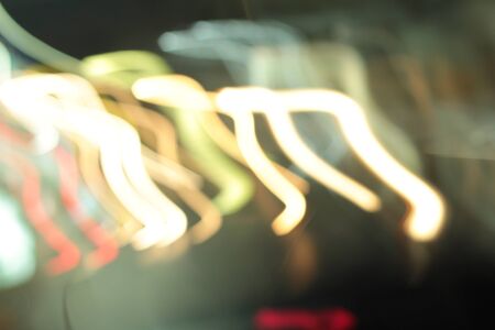 light background of car in city at nightの写真素材