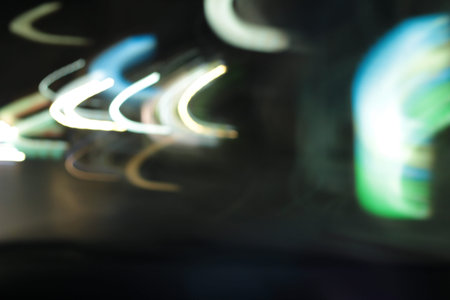 light background of car in city at night