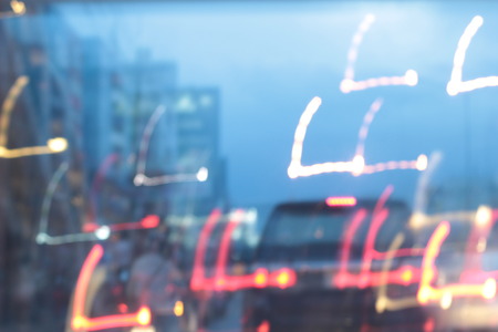 light background of car in city at nightの写真素材