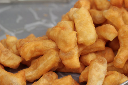 Deep-fried dough stick in marketの写真素材