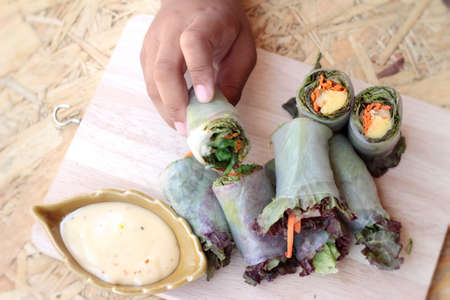 Vegetable salad wrapped into spring rolls deliciousの写真素材
