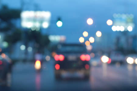 Blurred bokeh of car in city at night.の写真素材