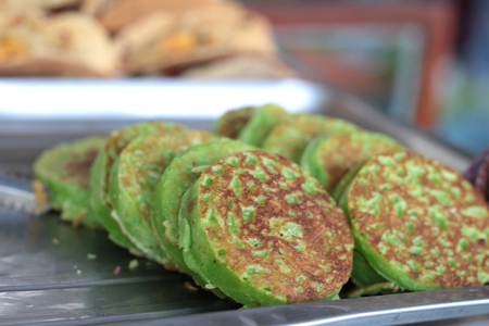Thailand dessert, Mix flour, coconut and then fried.の写真素材