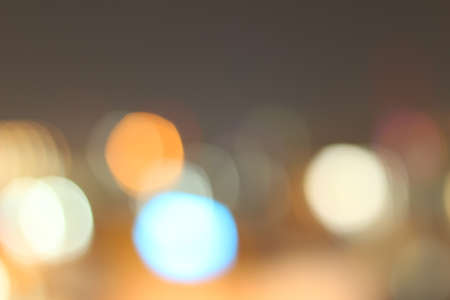 Blurred of car in city at nightの写真素材
