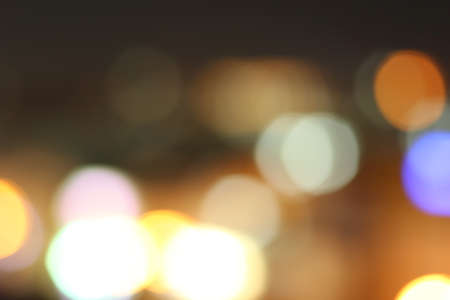 Blurred of car in city at nightの写真素材