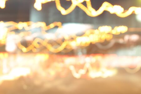 light background of car in city at nightの写真素材