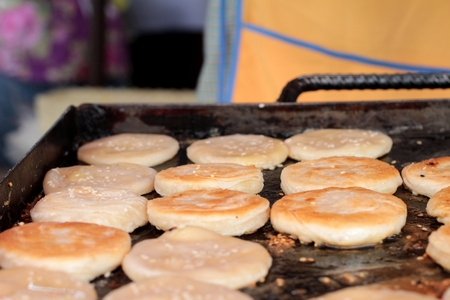 Thailand dessert, Mix flour, coconut and then fried.の写真素材