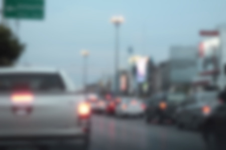 blurred of car on road at the cityの写真素材