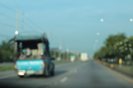blurred of car on roadの写真素材