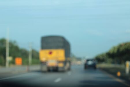 blurred of car on roadの写真素材