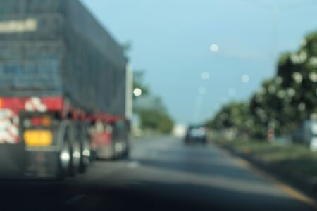 blurred of car on roadの写真素材