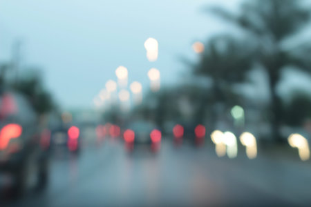 Blurred bokeh of car in city at night