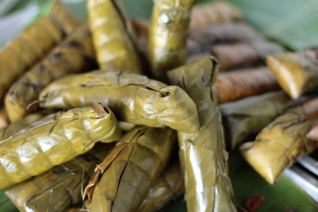 Sticky rice wrapped in banana leaves - dessert Thailand.の写真素材