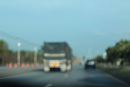 blurred of car on roadの写真素材