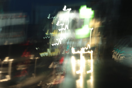 light background of car in city at nightの写真素材