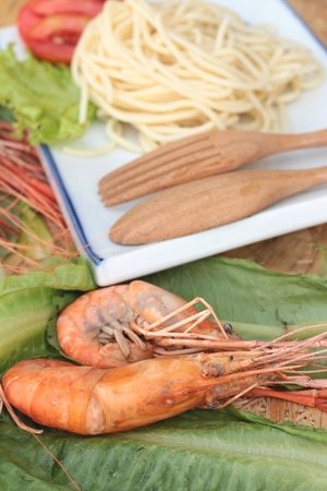 Pasta spaghetti with shrimp on the plate.の写真素材
