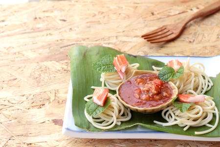 Pasta spaghetti with crab sticks and sauce.の写真素材