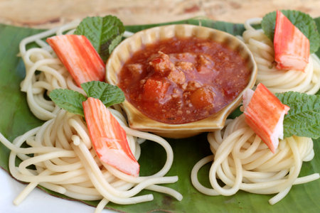 Pasta spaghetti with crab sticks and sauce.の写真素材