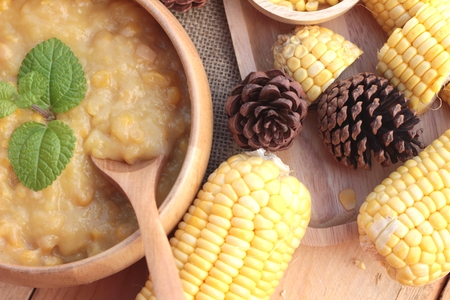 Corn soup of condensed in a wooden bowlの写真素材