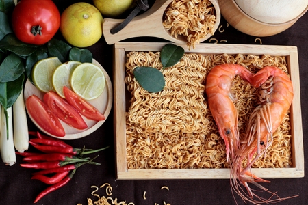 Dry instant noodle - asian ramen and shrimp ,vegetables for soupの写真素材