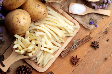 French fries and fresh potatoes sliced