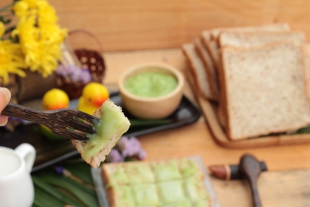 Bread with green custard and fresh milkの写真素材