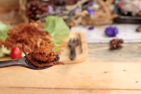 Dry roast pork into strips and raw porkの写真素材