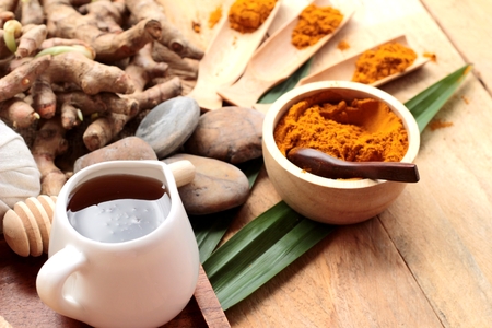 Phlai herb, Cassumunar ginger both fresh and as a powder for the skin scrubの写真素材