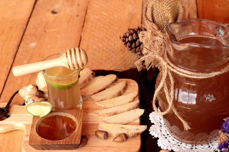 Ginger water of herb and fresh ginger with honeyの写真素材