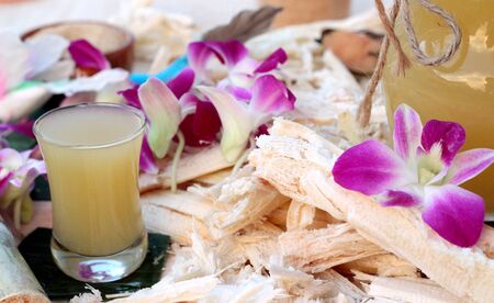 Juice of fresh sugar cane for drinks and sugarの写真素材