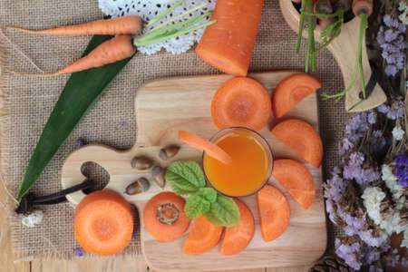 Fresh carrots and carrot juice are deliciousの写真素材