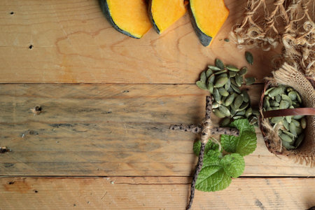 Fresh pumpkin slice with pumpkin seeds dryの写真素材