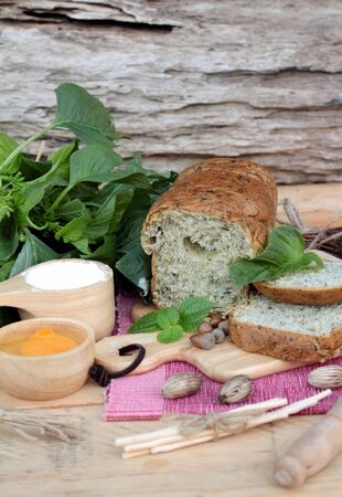 Spinach bread and fresh spinach with making bakerの写真素材
