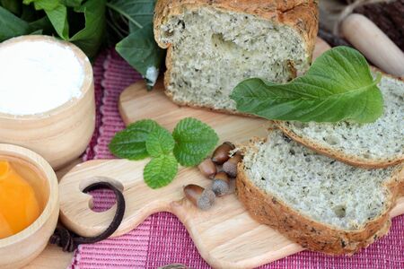 Spinach bread and fresh spinach with making bakerの写真素材